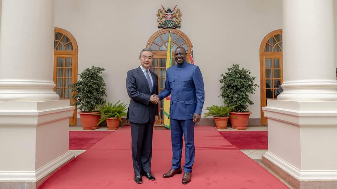 File image of President William Ruto with Chinese Director of the Office of Central Committee for Foreign Affairs Wang Yi.